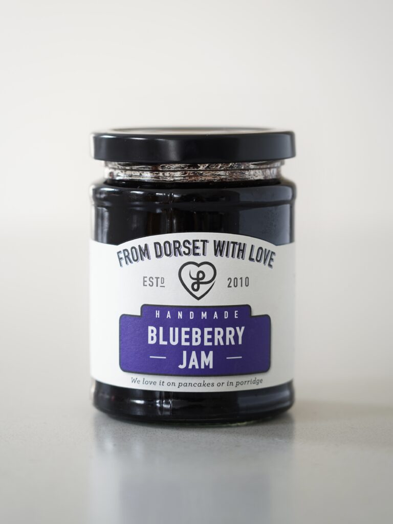 portrait of From Dorset With Love's Blueberry Jam on a grey kitchen worktop
